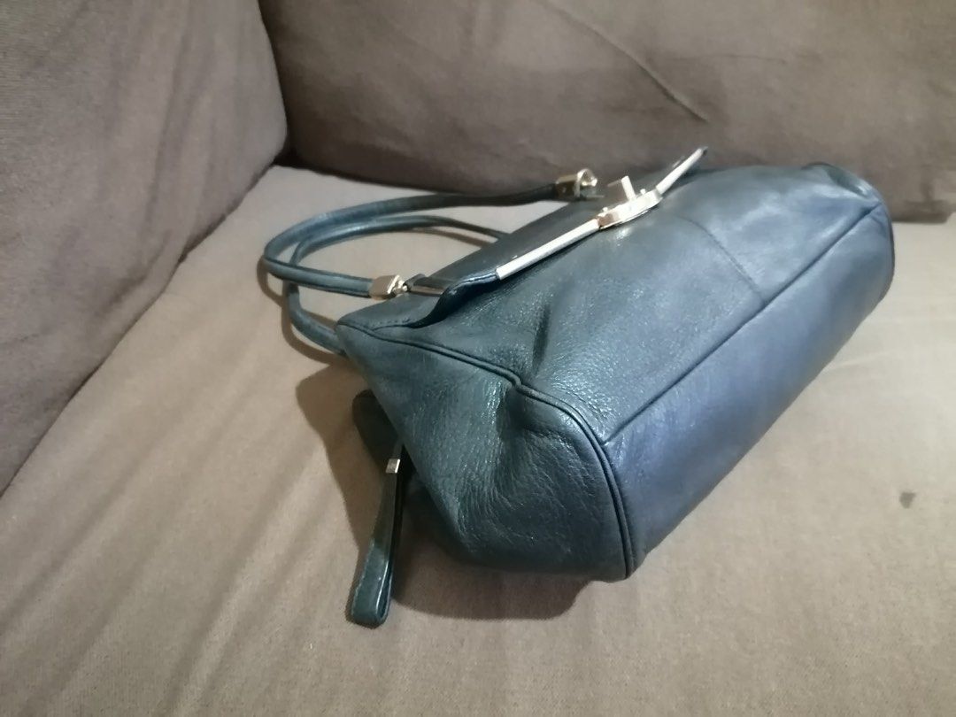COACH authentic kili shoulder bag (Category: Shoulder Bags) located in Manila. Submitted by momsluxes (Listing ID 1462072789, Image 3). Description: • authentic • preowned • no refund,no return, no exchange • please manage your expectations and please evaluate posted photos before buying....