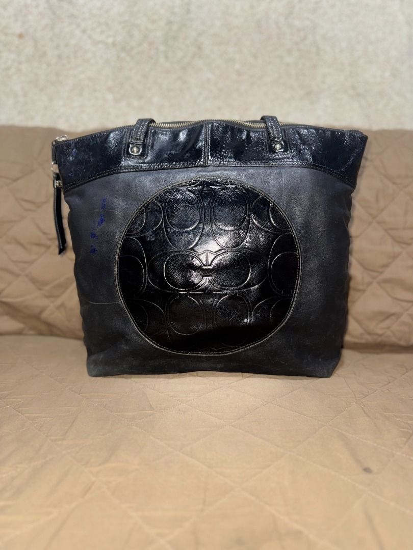 COACH LAURA TOTE (Category: Luxury Bags & Wallets) located in San Pablo. Submitted by calmhawk.60c993 (Listing ID 1462093451, Image 1). Description: a Coach Laura Signature Embossed Leather Tote, which stands out with its circular patent leather panel featuring the iconic embossed "C" signature pattern. this is authentic from canada pasalubong from my sister in law slightly used have minor issue like a blue stain coz my toddler loves to draw alam
