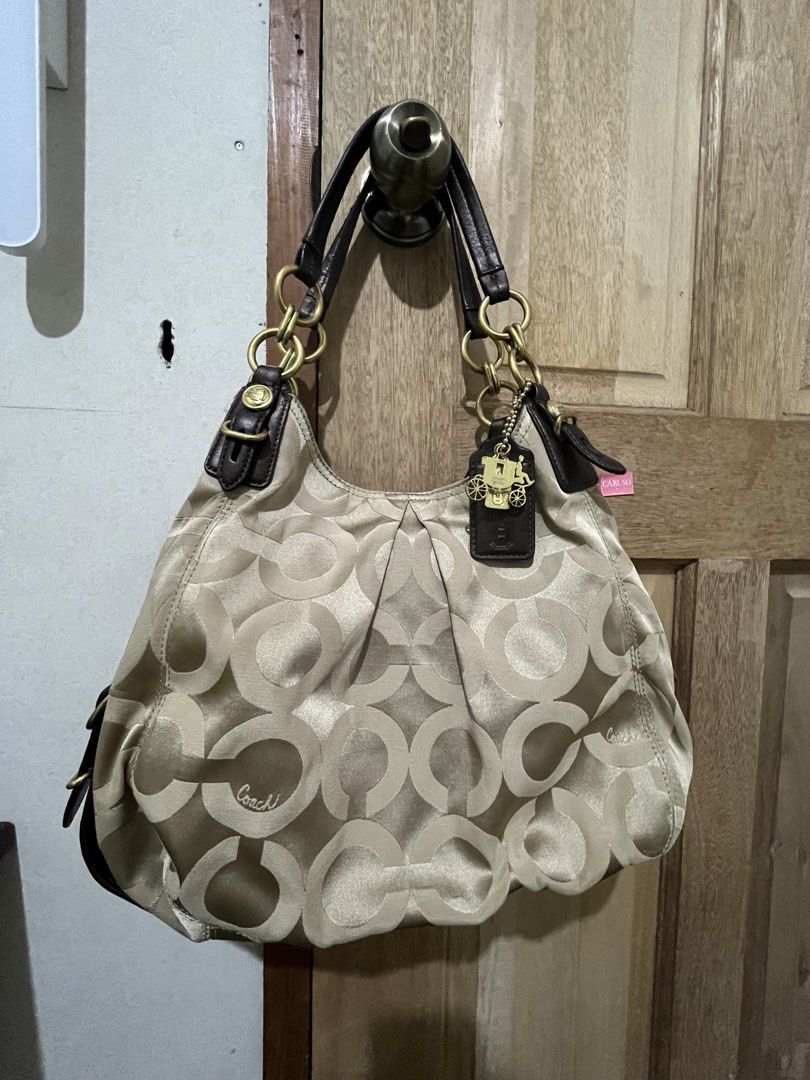 Coach Maggie Madison Bag (Category: Luxury Bags & Wallets) located in Vintar. Submitted by layla.ly (Listing ID 1462092380, Image 2). Description: - Authentic Coach monogram shoulder bag - Minor rubs on the bottom part and faded metal hardware .
