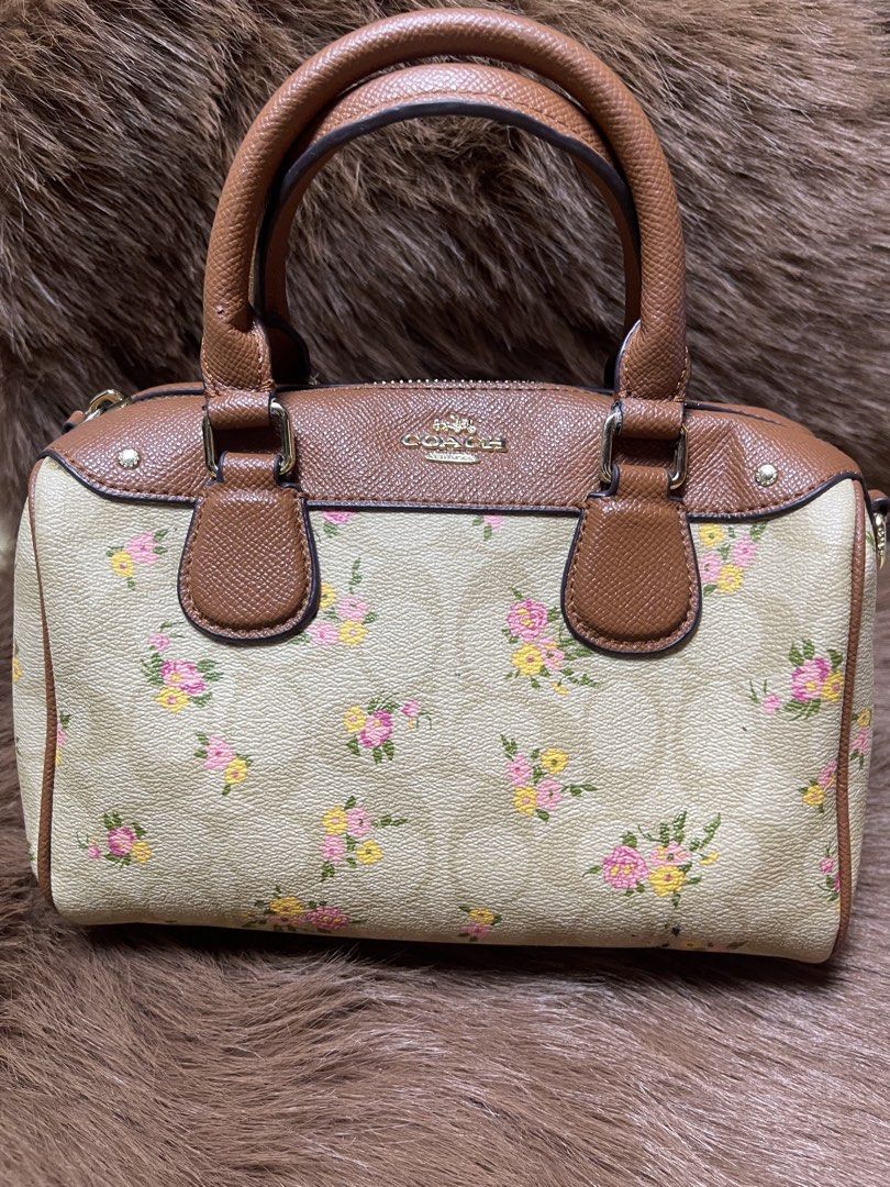 Coach Mini Bennett Satchel (F31777) (Category: Cross-body Bags) located in Imus. Submitted by cheratedfinds (Listing ID 1462128044, Image 1). Description: Coach New York (Original Outlet Line) • Model: Mini Bennett Satchel Crossbody • Style Code: F31777 • Material: Coated Signature Canvas with Crossgrain Leather Trim • Colorway: Light Khaki / Multi Floral / Tan Trim / Gold Hardware • Origin: Made in Vietnam • Inclusions: Detachable & adjustable c