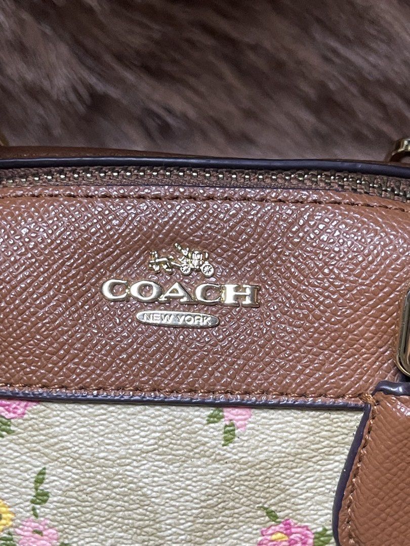 Coach Mini Bennett Satchel (F31777) (Category: Cross-body Bags) located in Imus. Submitted by cheratedfinds (Listing ID 1462128044, Image 2). Description: Coach New York (Original Outlet Line) • Model: Mini Bennett Satchel Crossbody • Style Code: F31777 • Material: Coated Signature Canvas with Crossgrain Leather Trim • Colorway: Light Khaki / Multi Floral / Tan Trim / Gold Hardware • Origin: Made in Vietnam • Inclusions: Detachable & adjustable c