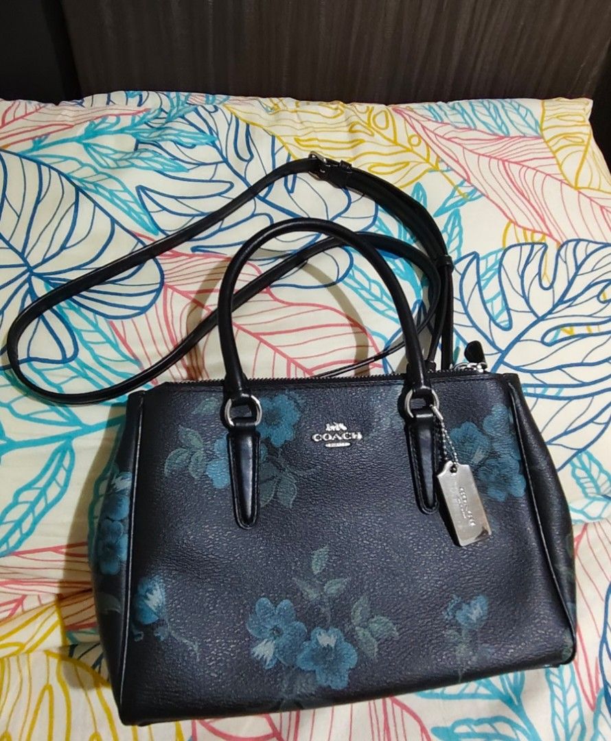 Coach mini Surrey floral blue black multi bag (Category: Shoulder Bags) located in Pasig City. Submitted by serrancr (Listing ID 1462170515, Image 1). Description: - Stylish black Coach satchel - Pretty blue floral print - Top handles for easy carrying - Detachable crossbody strap for versatility - Secure zipper closure - Interior lined with black fabric - Comes with original Coach hangtag - Proudly made in the Philippines - Ideal for everyday us