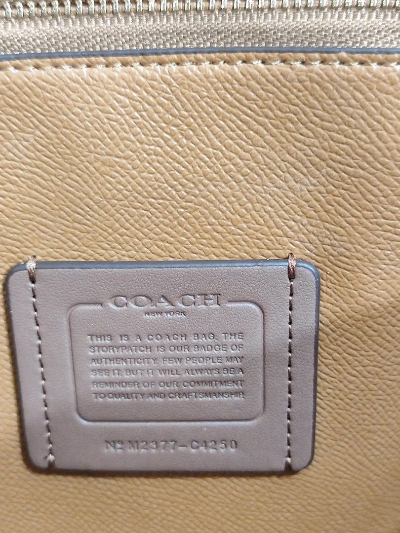 Coach Mollie Bag (Category: Luxury Bags & Wallets) located in Paranaque City. Submitted by peachmangojam (Listing ID 1462053510, Image 3). Description: - Coach tote bag in signature canvas - Color: Tan and brown - Features leather trim and handles - Interior zippered pocket - Gold hardware details - Includes Coach leather hangtag - Ideal for everyday use.