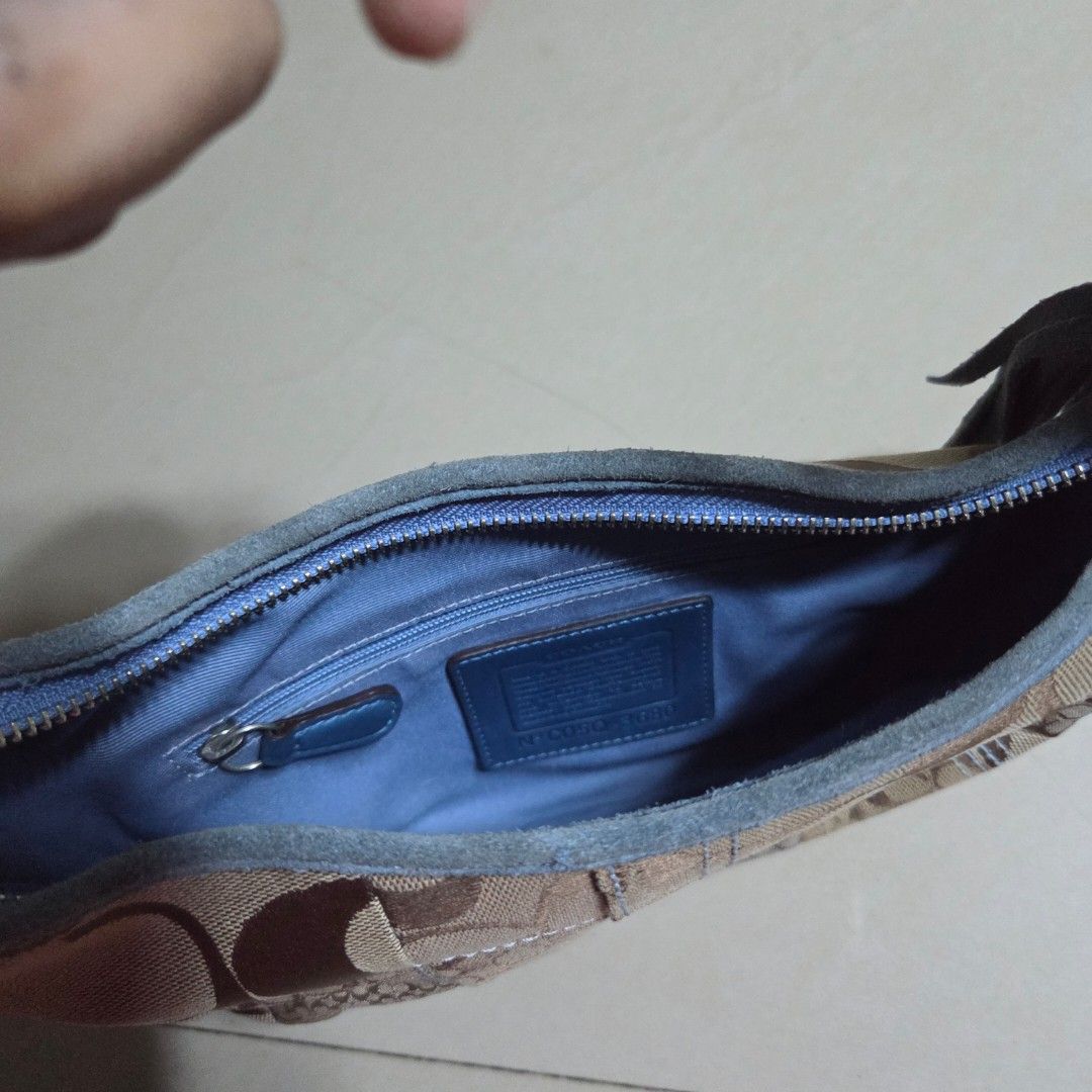 Coach Monogram Python Patchwork Hobo Bag (Category: Luxury Bags & Wallets) located in San Mateo. Submitted by liezelsells (Listing ID 1462067724, Image 3). Description: Guaranteed Authentic. YKK Zipper. Needs Cleaning. Condition: 9/10 Location: San Mateo, Rizal MOP: GCash. NO COD. Couriers: Lalamove, J&T, LBC, JRS. NO Return, Exchange, Refund. .