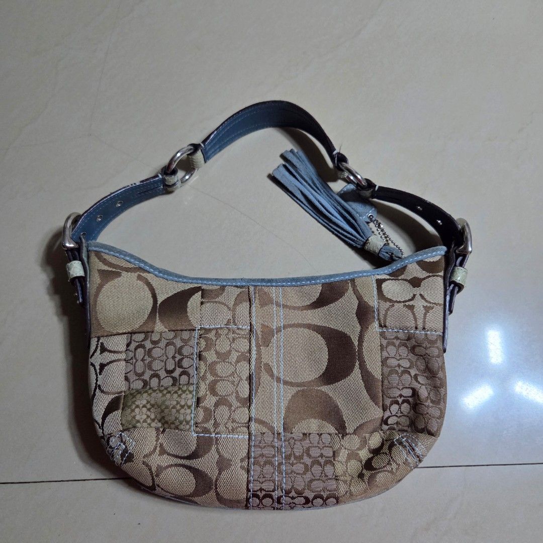 Coach Monogram Python Patchwork Hobo Bag (Category: Luxury Bags & Wallets) located in San Mateo. Submitted by liezelsells (Listing ID 1462067724, Image 2). Description: Guaranteed Authentic. YKK Zipper. Needs Cleaning. Condition: 9/10 Location: San Mateo, Rizal MOP: GCash. NO COD. Couriers: Lalamove, J&T, LBC, JRS. NO Return, Exchange, Refund. .