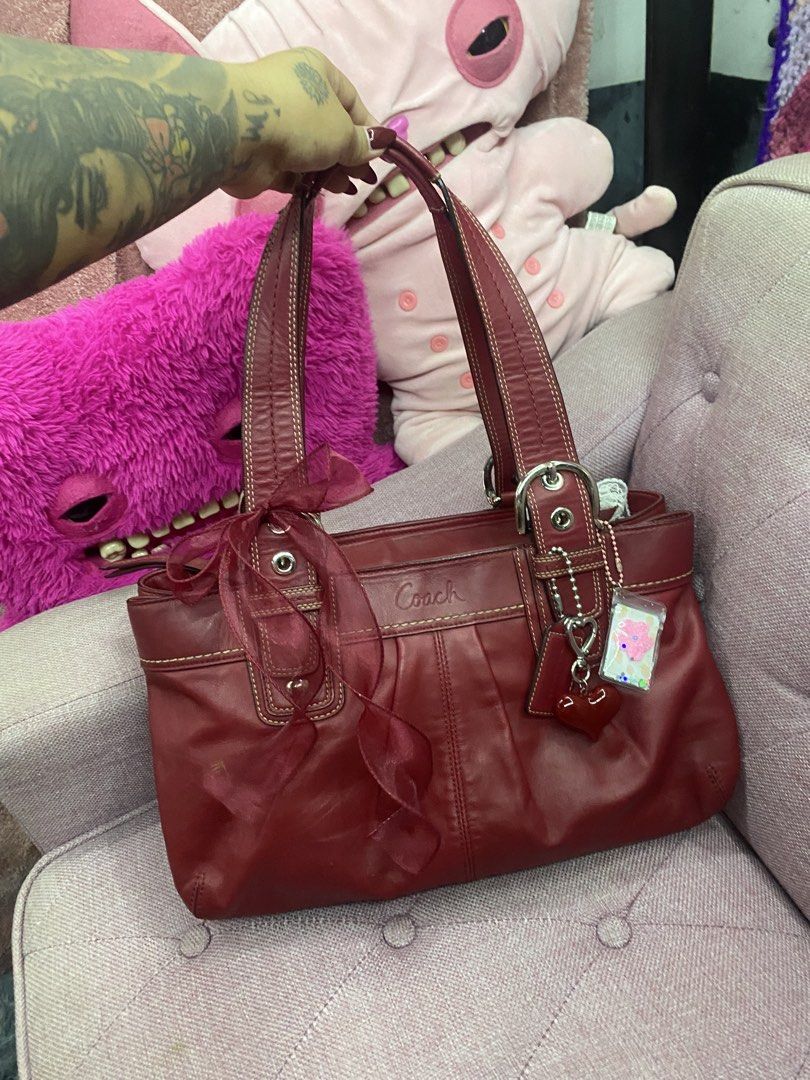 Coach pleated soho (RED) 🍒 (Category: Luxury Bags & Wallets) located in Calauan. Submitted by _ramona (Listing ID 1462090505, Image 2). Description: Rubber lining intact minimal hairline scratches hardware makinis pa minimal kurot sa body almost unnoticeable watermarks sa ilalim applied leather cpr few times SEE LAST 2 SLIDES FOR REFERENCE CURRENT MARKET VALUE NOWWW can dm me on 💙 app for more detailed photos charms not included hangtag present