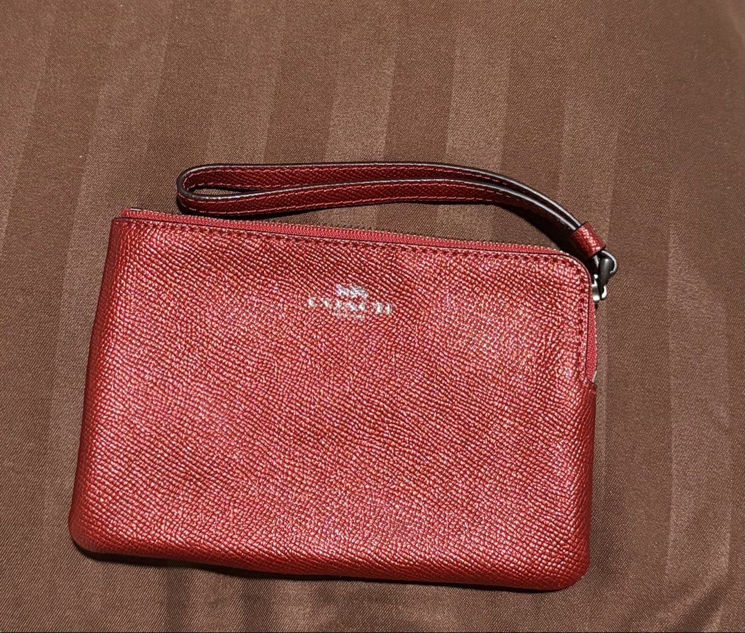 coach wristlet (Category: Purses & Pouches) located in Quezon City. Submitted by mariamaharba7798 (Listing ID 1462118042, Image 1). Description: pm for more details .