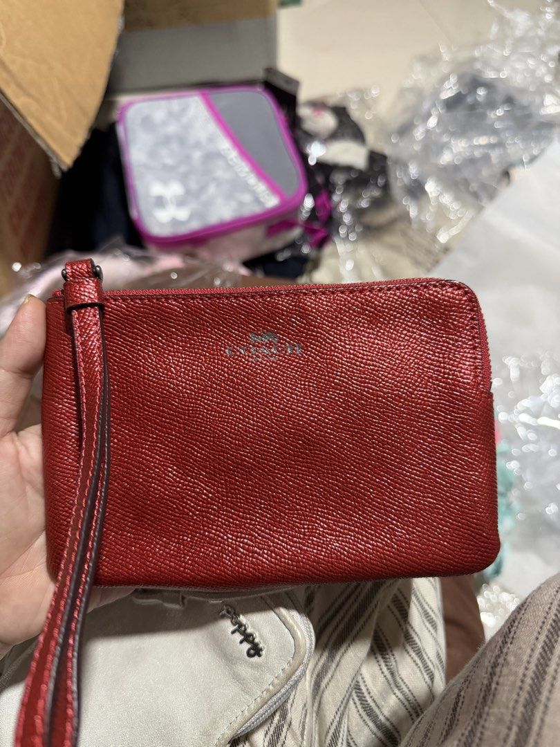 coach wristlet (Category: Purses & Pouches) located in Quezon City. Submitted by mariamaharba7798 (Listing ID 1462118042, Image 2). Description: pm for more details .