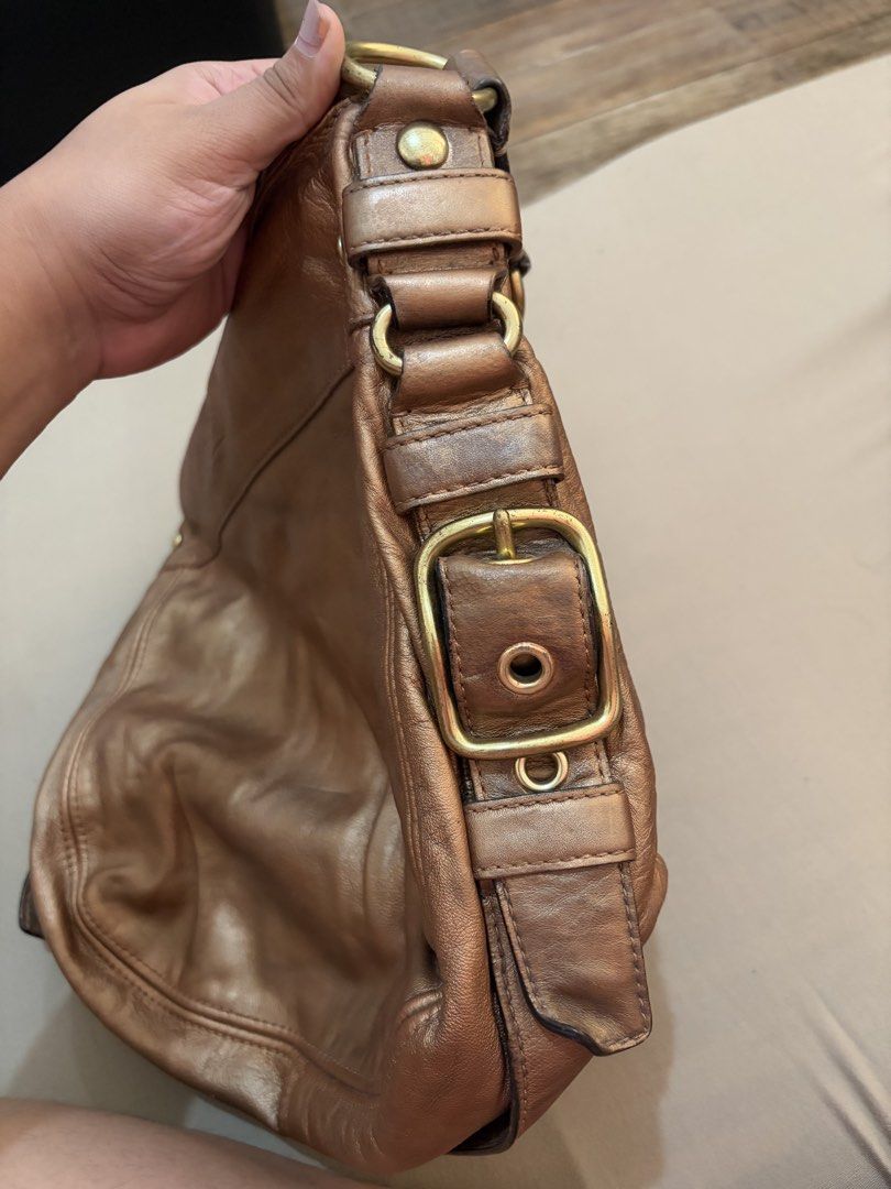 Coach Zoe in Metallic Gold (Category: Luxury Bags & Wallets) located in Alcala. Submitted by samsationalfinds (Listing ID 1462133966, Image 2). Description: Once lang nagamit since binili ko. Y2k vibes! .