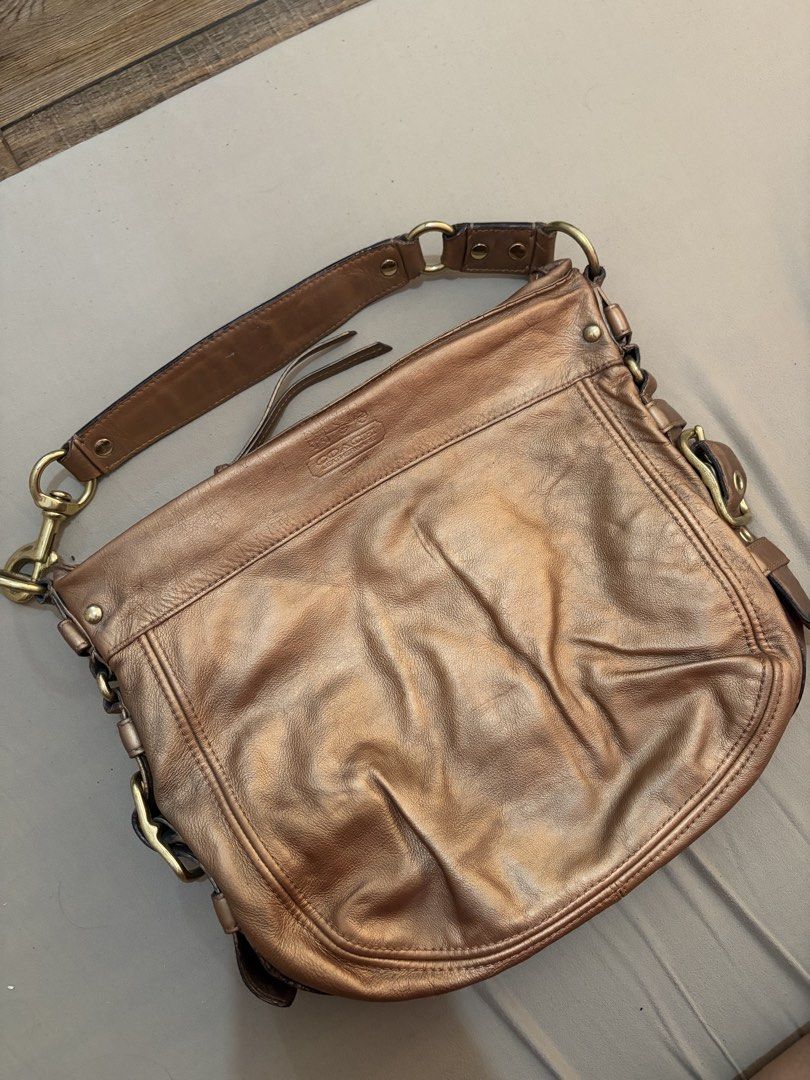 Coach Zoe in Metallic Gold (Category: Luxury Bags & Wallets) located in Alcala. Submitted by samsationalfinds (Listing ID 1462133966, Image 1). Description: Once lang nagamit since binili ko. Y2k vibes! .