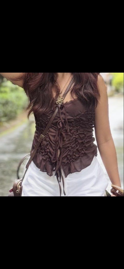 Coachella brown ruffled top (Category: Sleeveless) located in Manila. Submitted by khyscloset (Listing ID 1462211127, Image 2). Description: Bought for P700 Used only once Fits XS-M.