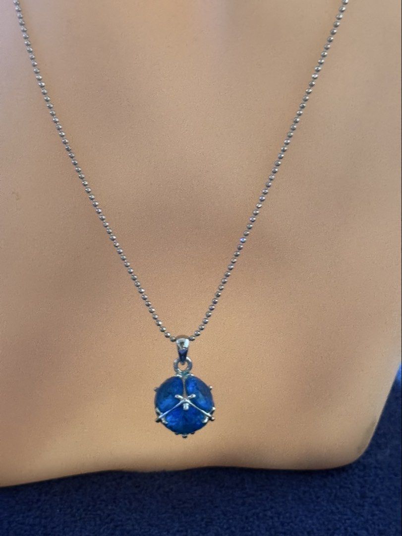 cobalt blue orb pendant (Category: Necklaces) located in Angeles City. Submitted by zyeplustradings (Listing ID 1462121277, Image 1). Description: cobalt blue orb pendant silver-toned ball chain necklace featuring a faceted blue stone pendant held in a prong setting..
