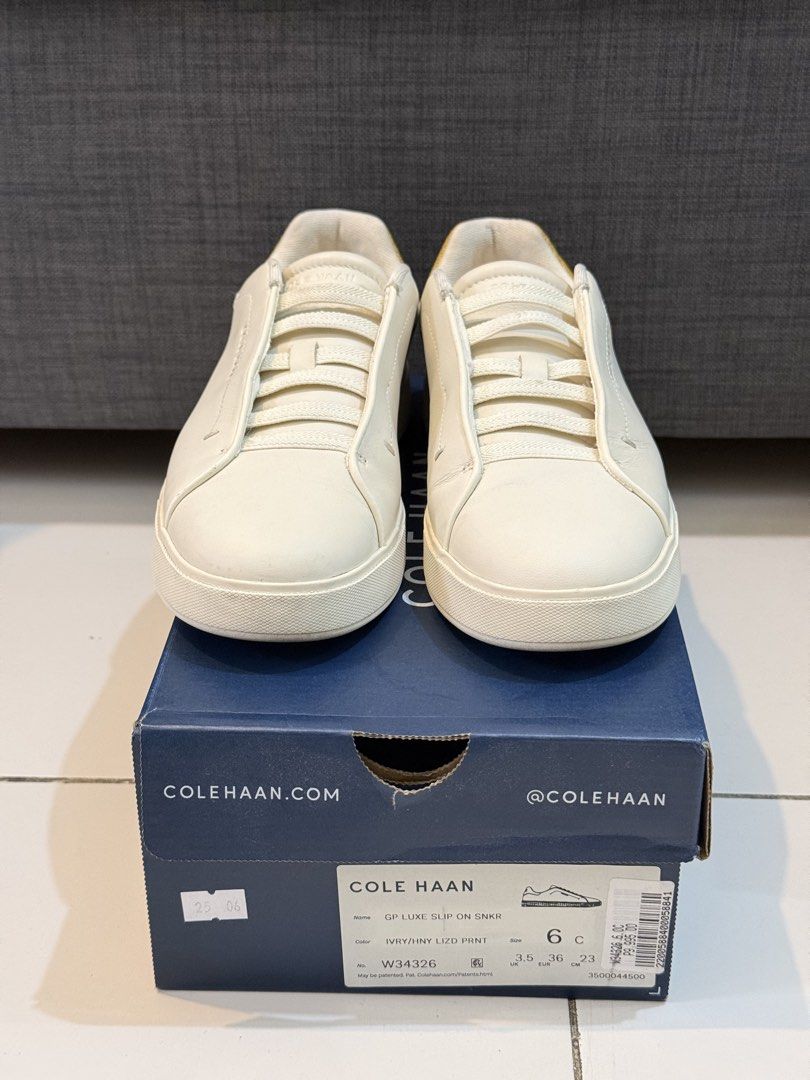Cole Haan GP Luxe Slip On Sneakers (Category: Sneakers) located in Taguig. Submitted by rgspreloved (Listing ID 1462049062, Image 3). Description: - Brand: Cole Haan - Style: Slip-on sneakers - Color: Ivory - Detail: Honey lizard print on heel - Comfort: Super comfy and easy to wear - Includes: Original box - Original price: ₱9,995.