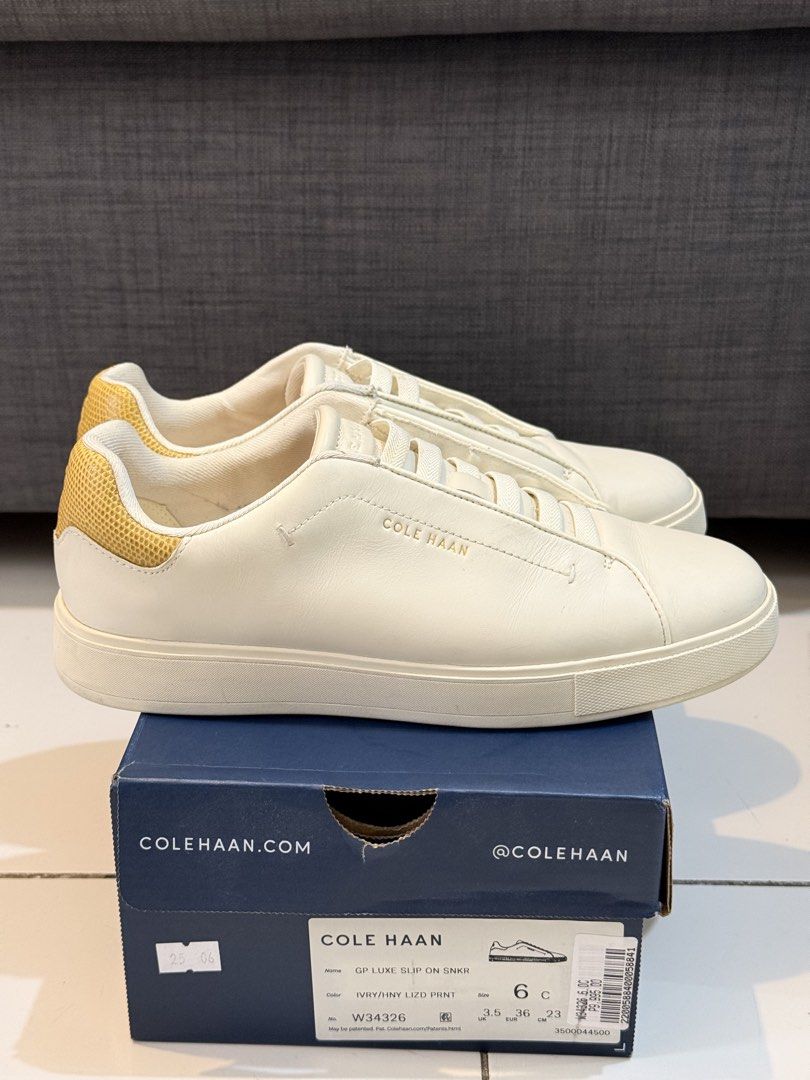 Cole Haan GP Luxe Slip On Sneakers (Category: Sneakers) located in Taguig. Submitted by rgspreloved (Listing ID 1462049062, Image 1). Description: - Brand: Cole Haan - Style: Slip-on sneakers - Color: Ivory - Detail: Honey lizard print on heel - Comfort: Super comfy and easy to wear - Includes: Original box - Original price: ₱9,995.