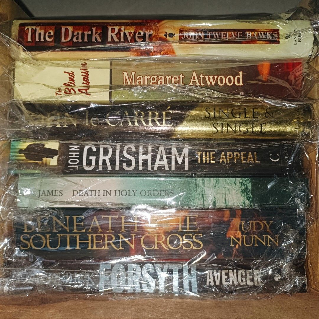 Collection of 6 Paperback Novels (Category: Storybooks) located in Guagua. Submitted by pvnkish.read (Listing ID 1462079267, Image 1). Description: - Bundle of 6 paperback novels - Authors include: John Twelve Hawks, Margaret Atwood, John le Carré, John Grisham, P.D. James, and Judy Nunn - All books are individually wrapped in plastic - Great collection for any book lover.