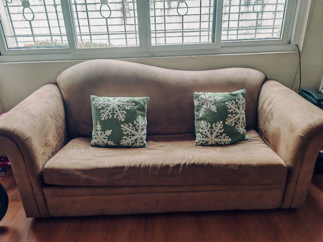 Comfortable 2-Seater Sofa (Category: Sofas) located in Quezon City. Submitted by sakurafujin (Listing ID 1462046808, Image 1). Description: - Cozy 2-seater sofa with soft, textured beige fabric - with stains and small holes - well used Rfs: switched to new sofa Shipping/ pick up c/o buyer Throw pillows not included .