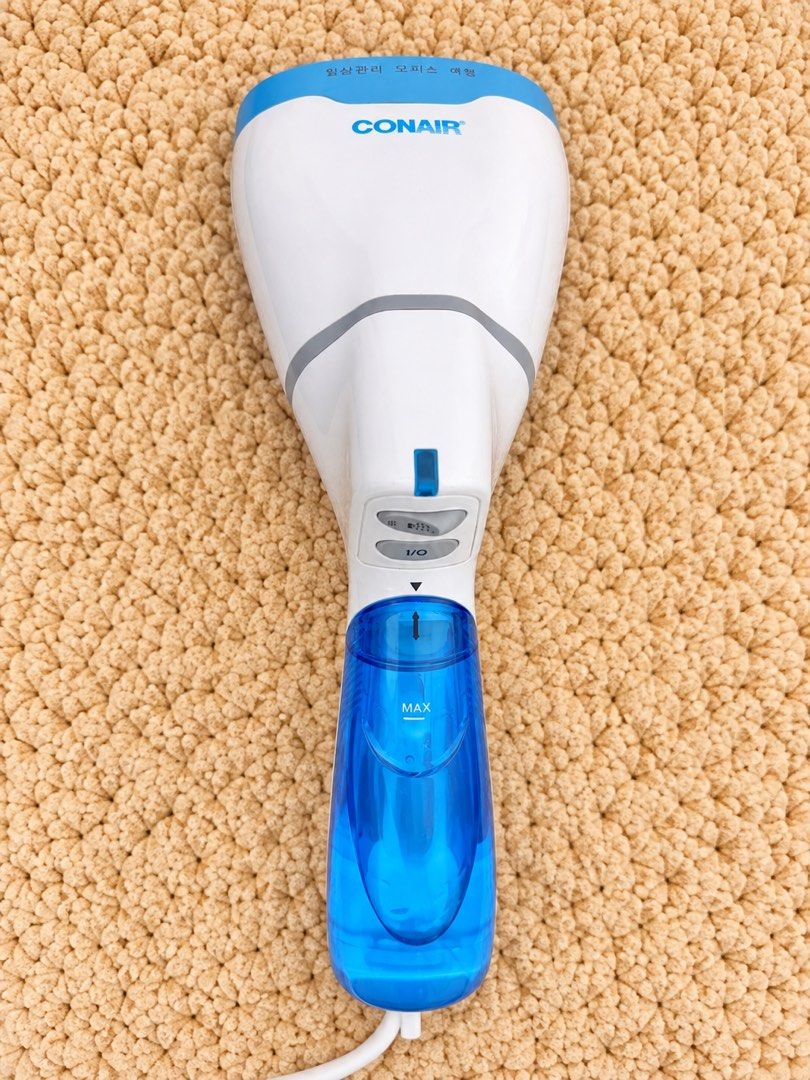 CONAIR Garment Steamer (Category: Irons & Steamers) located in Quezon City. Submitted by ShopNShip (Listing ID 1462186710, Image 1). Description: CONAIR Handheld Garment Steamer 👔✨ 💨 Powerful steam for removing wrinkles 👕 Perfect for clothes, dresses, suits & delicate fabrics 💧 Built-in water tank with MAX level indicator 🎛️ Easy-to-use controls 🏠 Great for home, office & travel ✨ Quick touch-ups without needing an ironing board Pre-loved •