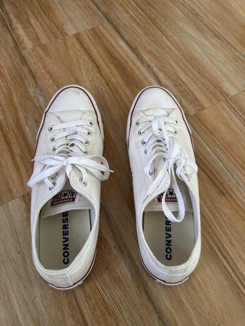 Converse All Star White Low Top Sneakers (Category: Casual Shoes) located in Manila. Submitted by fiercefox.60e06c (Listing ID 1462036052, Image 1). Description: - Classic white Converse low tops - Durable canvas material - Iconic Chuck Taylor ankle patch - White laces - Rubber sole with red stripe detail - Versatile for everyday wear and any outfit.