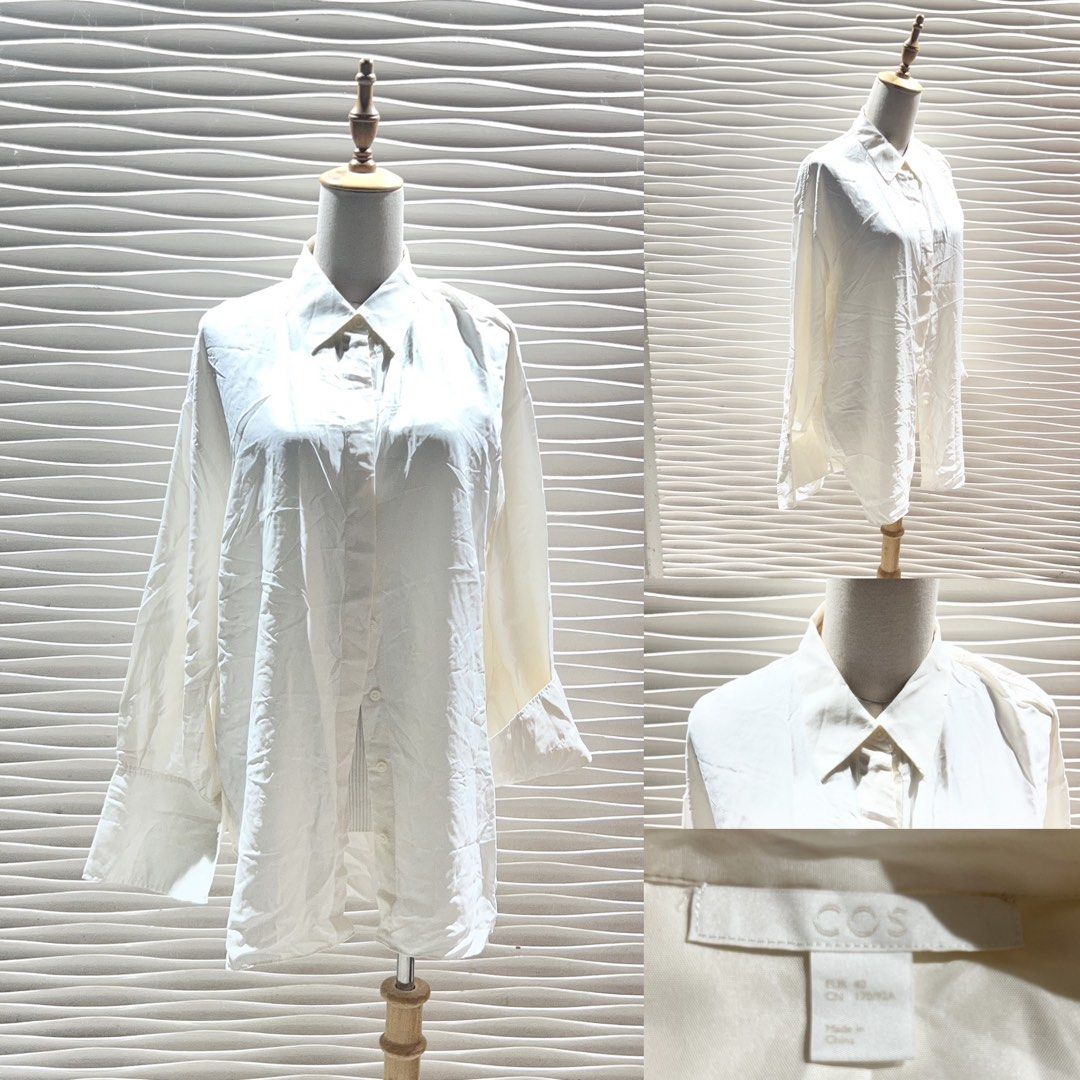 COS Cream Oversized Button-Up Shirt (Category: Shirts) located in Bacolod City. Submitted by bhabissagal-05763 (Listing ID 1462191472, Image 1). Description: - Cream colored button-up shirt from COS - Long sleeves with button cuffs - Relaxed, oversized fit - Silky material feel - Versatile for layering or wearing on its own.