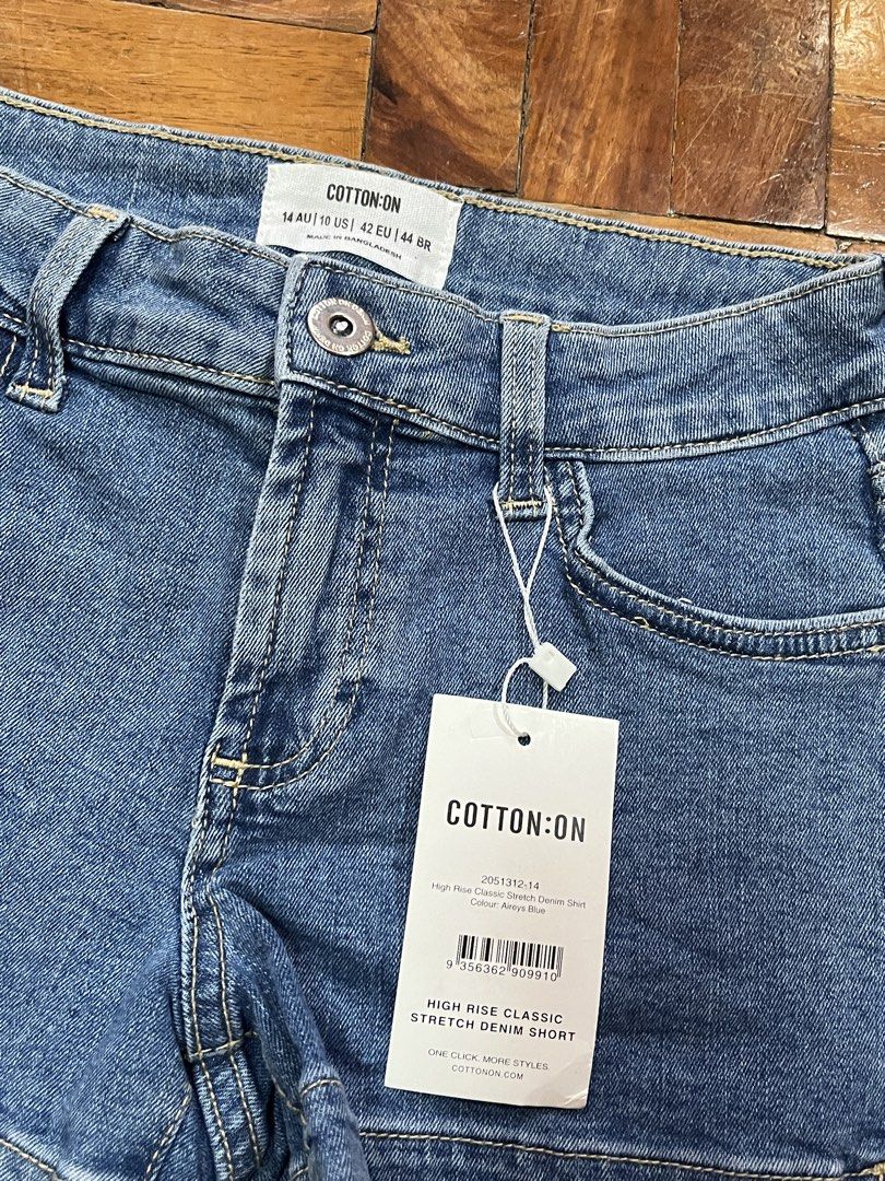 Cotton On Denim Shorts (Category: Babies & Kids Fashion) located in Manila. Submitted by graceeeeee_ (Listing ID 1462066296, Image 2). Description: - Brand: Cotton On - Style: High Rise Classic Stretch Denim Shorts - Color: Medium Wash Blue - Size: 14 AU / 10 US - Features: Super comfy and stretchy - Condition: Brand new with original tags attached - Perfect for: Casual wear.