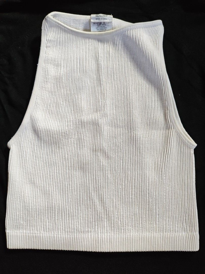 Cotton On Ribbed Tank Tops (Category: Sleeveless) located in Paranaque City. Submitted by anonymoosh (Listing ID 1462049494, Image 2). Description: Set of 2 ribbed tank tops: black (square neck, thick straps) and white (high neck, wide straps). Both cropped. Perfect wardrobe basics for layering or wearing solo. Take all for 500.