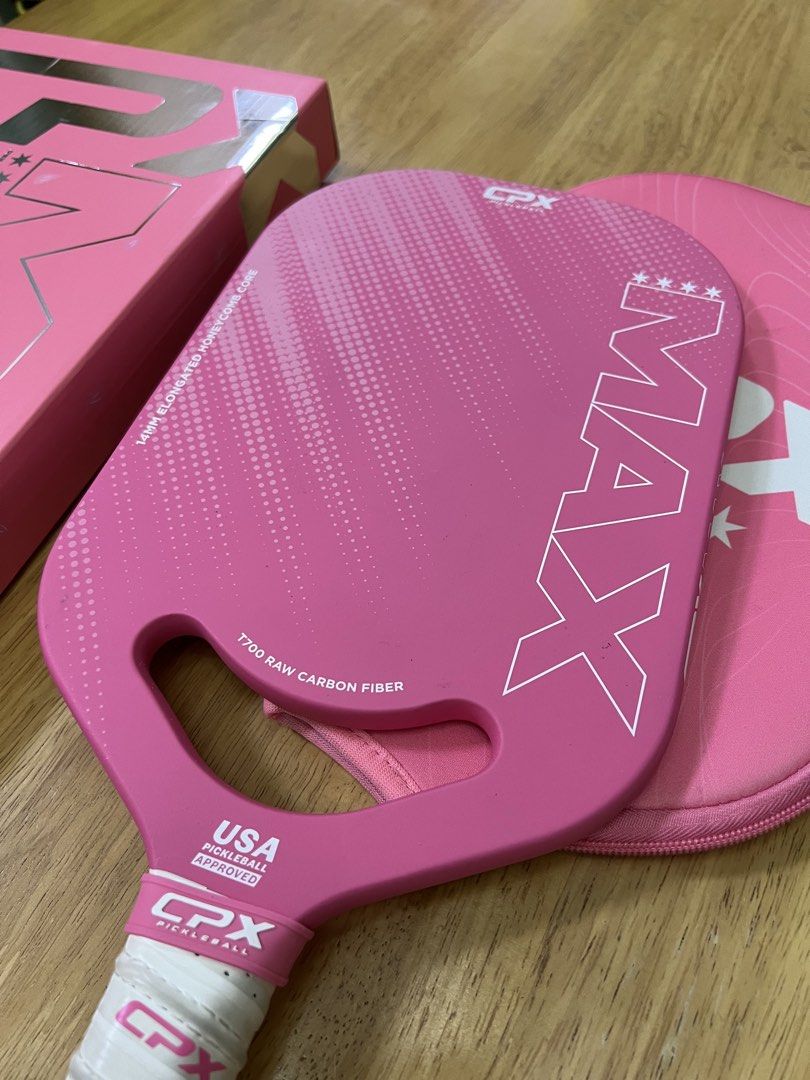 CPX MAX Limited Edition Sakura Series Pickleball Paddle (Category: Racket and Ball Sports) located in Quezon City. Submitted by cass.sells (Listing ID 1462200945, Image 3). Description: - Limited Edition Sakura Series CPX MAX pickleball paddle - T700 Raw Carbon Fiber construction - USA approved for tournament play - Includes original protective case and all original inclusions - Lady-owned - RFS: Have other paddles.