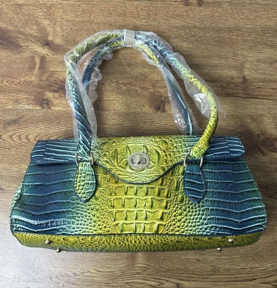 Crocodile Embossed Green & Teal Structured Top-Handle Handbag (Category: Purses & Pouches) located in Las Pinas. Submitted by piarre (Listing ID 1462104864, Image 2). Description: ~ brand new, never used, no flaws ~ for pre-order! shipping may take awhile for this item(1-2wks), your patience is appreciated :-) ~ shipping shall be shouldered by buyer!(j&t shipping is usually for ₱65 only) ~ mop: gcash, paymaya, bpi bank transfer, paypal ~ can crea