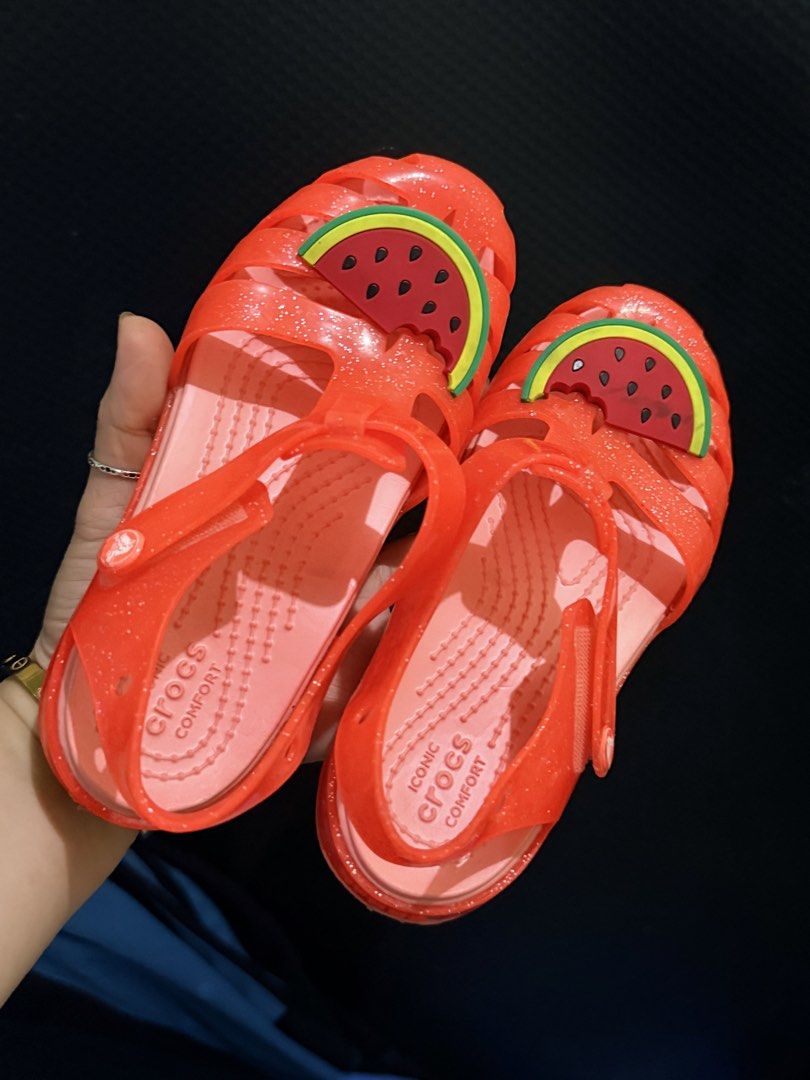 Crocs Glitter Watermelon Sandals (Category: Babies & Kids Fashion) located in Paete. Submitted by skydruemadison (Listing ID 1462041561, Image 1). Description: - Adorable red glitter Crocs sandals - Features a fun watermelon charm on the front strap - Easy slip-on and off design - Perfect for summer days and outdoor play - Soles provide good grip for safety c12.