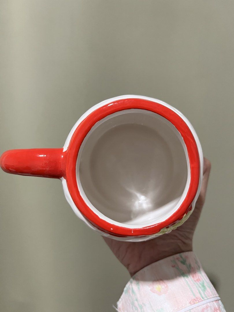 Cute Santa Claus Ceramic Mug (Category: Coffee & Tea Tableware) located in Manila. Submitted by vaughnscloset (Listing ID 1462071237, Image 3). Description: - Festive Santa Claus mug, perfect for holiday drinks like hot cocoa or coffee. - Features a classic Santa design with a red handle and hat details. - Adorable white beard and face design. - Ideal for Christmas parties, holiday gatherings, or as a thoughtful gift. - Conveniently dishwasher an