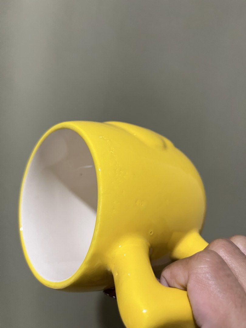 Cute Yellow Chick Ceramic Mug (Category: Coffee & Tea Tableware) located in Manila. Submitted by vaughnscloset (Listing ID 1462071062, Image 3). Description: - Adorable yellow chick design - Perfect for morning coffee or tea - Comfortable handle for easy grip - Ideal for gifting or kitchen decor - Dishwasher and microwave safe.