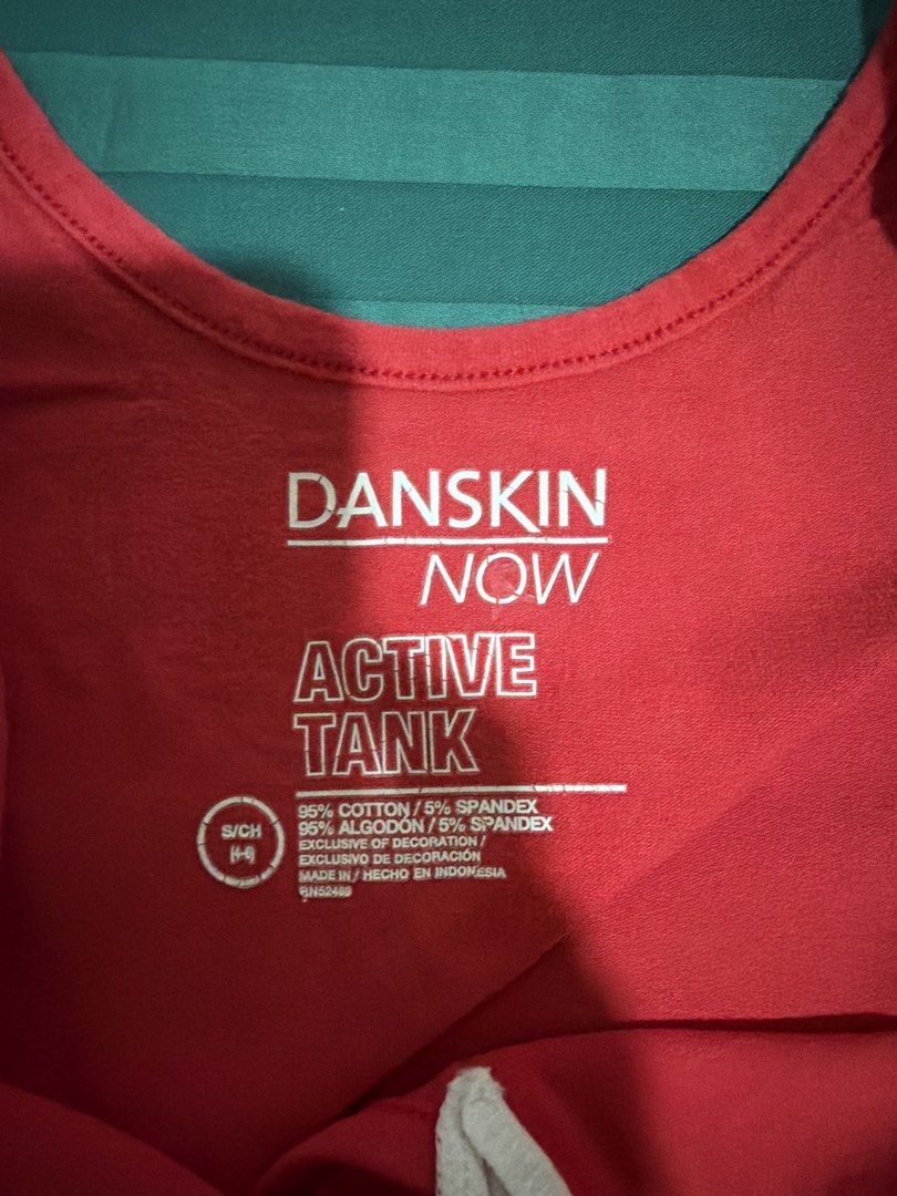 Danskin Now Active Tank Top Red Size S/CH (Category: Activewear) located in Las Pinas. Submitted by ces0427 (Listing ID 1462062564, Image 2). Description: - Red active tank top from Danskin Now - Size S/CH - Material: 95% cotton, 5% spandex - Features a small cutout detail at the neckline - Comfortable and breathable fabric - Ideal for workouts or casual wear.