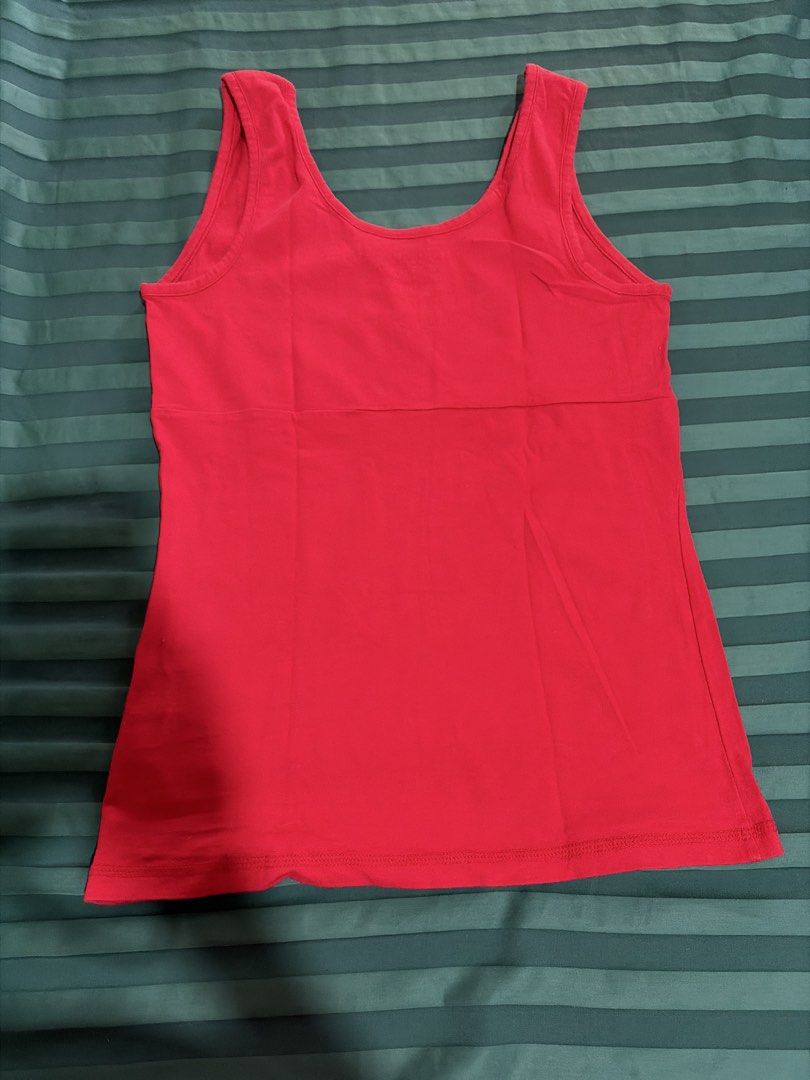 Danskin Now Active Tank Top Red Size S/CH (Category: Activewear) located in Las Pinas. Submitted by ces0427 (Listing ID 1462062564, Image 3). Description: - Red active tank top from Danskin Now - Size S/CH - Material: 95% cotton, 5% spandex - Features a small cutout detail at the neckline - Comfortable and breathable fabric - Ideal for workouts or casual wear.