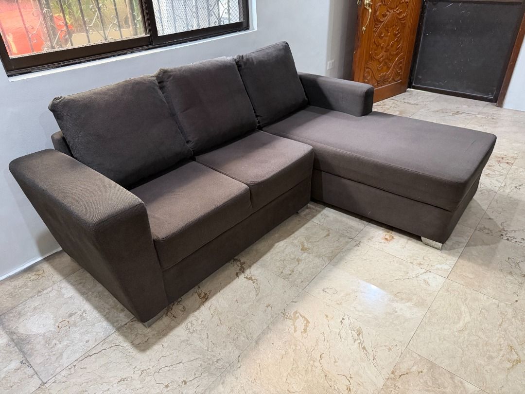 Dark Brown L-Shape Sectional Sofa Bed / Chaise Lounge - Great Condition (Category: Sofas) located in Makati City. Submitted by pinkytgo (Listing ID 1462039334, Image 3). Description: Selling a highly comfortable and space-saving L-shaped sectional couch with a right-facing chaise lounge. Perfect for cozy living rooms, condo units, or entertainment spaces! Color: Dark Brown / Espresso Brown Material: Premium, durable woven fabric upholstery with m