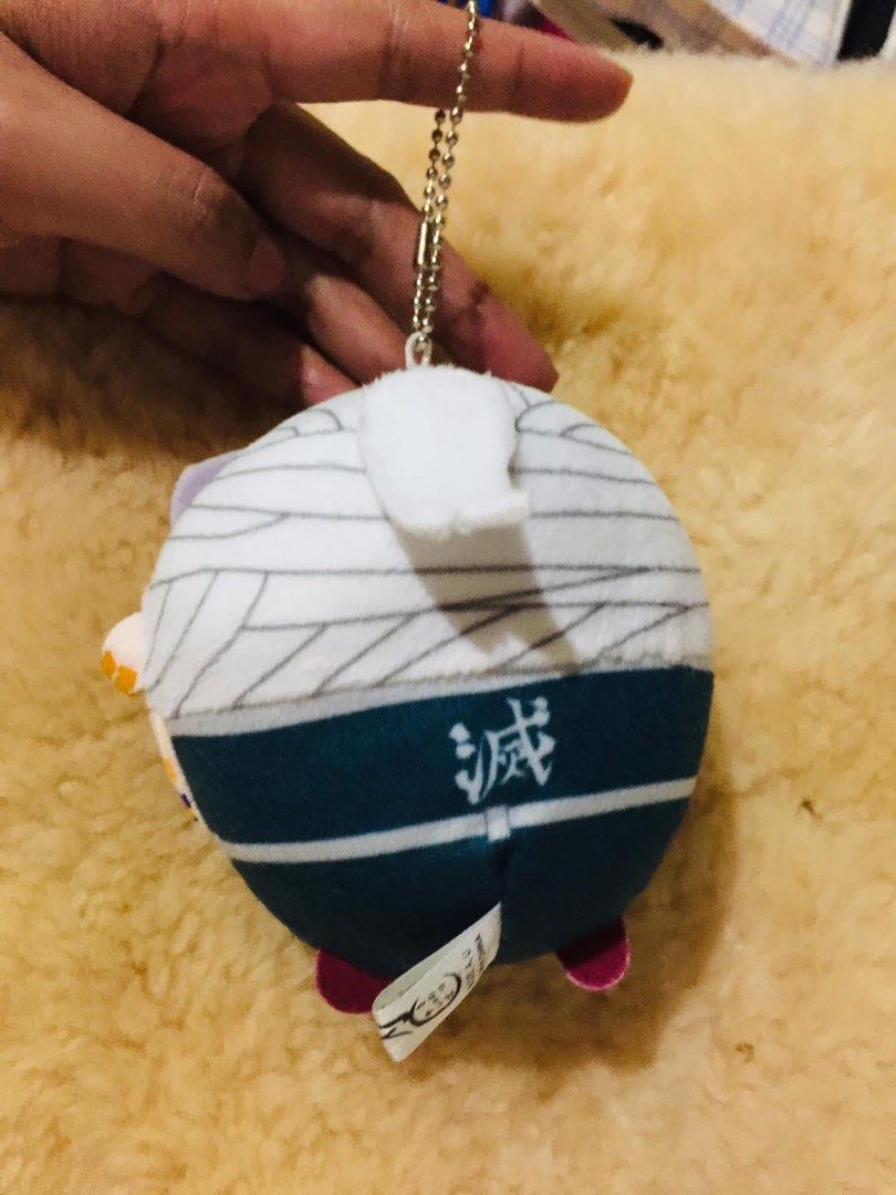 Demon Slayer Tanjiro Kamado Plush Keychain (Category: Plushies & Soft Toys) located in Baguio. Submitted by izza_thrifty (Listing ID 1462043906, Image 2). Description: - Adorable Demon Slayer plush keychain featuring Tanjiro Kamado. - Equipped with a durable metal chain for easy attachment. - Compact and portable, ideal for decorating bags, backpacks, or keys. - A must-have collectible for any fan of the anime series..