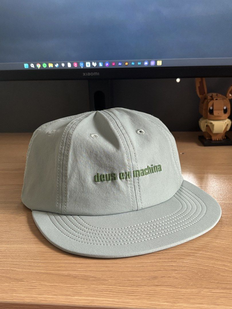 Deus Ex Machina Cap (Category: Caps & Hats) located in Cainta. Submitted by freykuz (Listing ID 1462099188, Image 1). Description: Deus Ex Machina 8 Panel Cap Shale Green Color Bought from ROX BGC (2026) never used but doesnt have tag anymore Pasig.