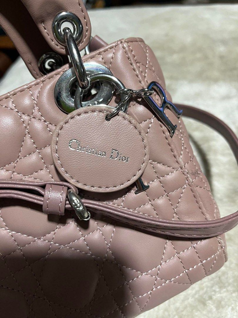 Dior Lady Dior Bag Pink Leather Mini (Category: Children's Beds) located in Mandaue City. Submitted by chuchi152615 (Listing ID 1462071698, Image 2). Description: - Dior Lady Dior Bag - Made in Italy - Color: Soft Pink Leather - Hardware: Silver Tone - Features: Detachable Shoulder Strap - Interior: Clean - A timeless and classic piece.