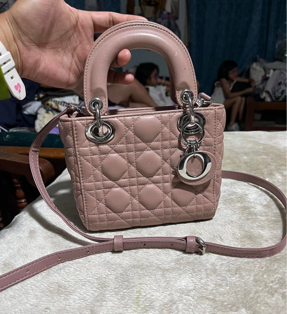 Dior Lady Dior Bag Pink Leather Mini (Category: Children's Beds) located in Mandaue City. Submitted by chuchi152615 (Listing ID 1462071698, Image 3). Description: - Dior Lady Dior Bag - Made in Italy - Color: Soft Pink Leather - Hardware: Silver Tone - Features: Detachable Shoulder Strap - Interior: Clean - A timeless and classic piece.
