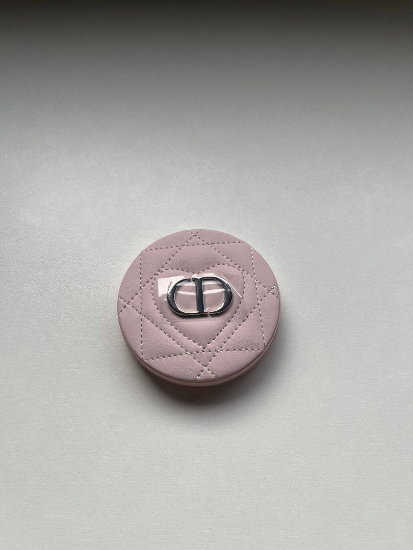 Dior Quilted Compact Mirror Pink (Category: Makeup) located in Manila. Submitted by jangwg_ (Listing ID 1462215105, Image 2). Description: - Authentic Gift with Purchase Dior compact mirror - Chic pink quilted design with iconic CD logo - Features two mirrors for convenient use - Compact and portable for easy carrying - Ideal for quick touch-ups anytime, anywhere - Includes original packaging/box.