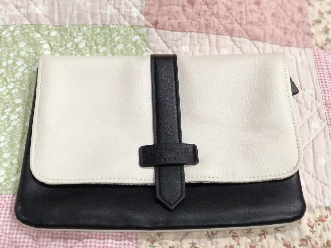 Diptyque Black and White Cosmetic Pouch (Category: Accessory Holder, Box & Organizers) located in Quezon City. Submitted by sheisdecluttering_now (Listing ID 1462076457, Image 1). Description: from Qatar Airways .
