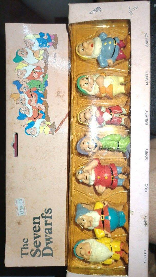 Disney The Seven Dwarfs Figurines Set (Category: Figurines & Statues) located in Caloocan City. Submitted by chuaniki (Listing ID 1462144456, Image 1). Description: - Complete set of The Seven Dwarfs figurines - Includes all seven characters: Doc, Grumpy, Happy, Sleepy, Bashful, Sneezy, and Dopey - Comes in original packaging - Figures are in great shape - Ideal for collectors or Disney fans.