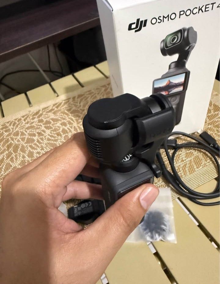 DJI OSMO POCKET 4 CREATOR COMBO (Category: Video Cameras) located in Quezon City. Submitted by antawnmanganti (Listing ID 1462094943, Image 2). Description: brand-new open box only with travel bag & SD card 1tb.