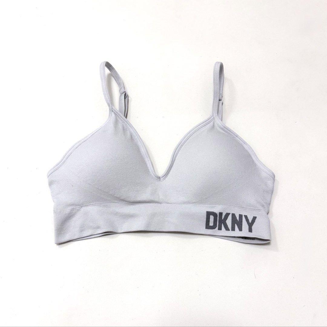 DKNY Light Grey Seamless Bralette [S] (Category: Undergarments & Loungewear) located in Malabon City. Submitted by kmby_ (Listing ID 1462209116, Image 1). Description: Details: • Size Small / padded • Like new (has washable dirt only, but will wash it before I sent out) • Light grey DKNY seamless bralette featuring adjustable straps and the brand logo on the ribbed underband..