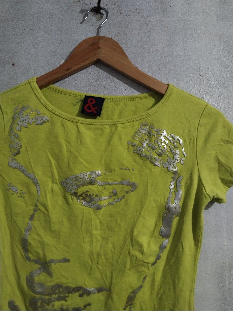 Dolce & Gabbana & Ampersand Graphic Tee (Category: Shirts) located in Tabaco. Submitted by skycat_29 (Listing ID 1462183621, Image 3). Description: - Eye-catching lime green t-shirt - Features a unique silver graphic print of a face - Classic short sleeves and crew neck design - Proudly made in Italy - Ideal for casual and everyday wear.