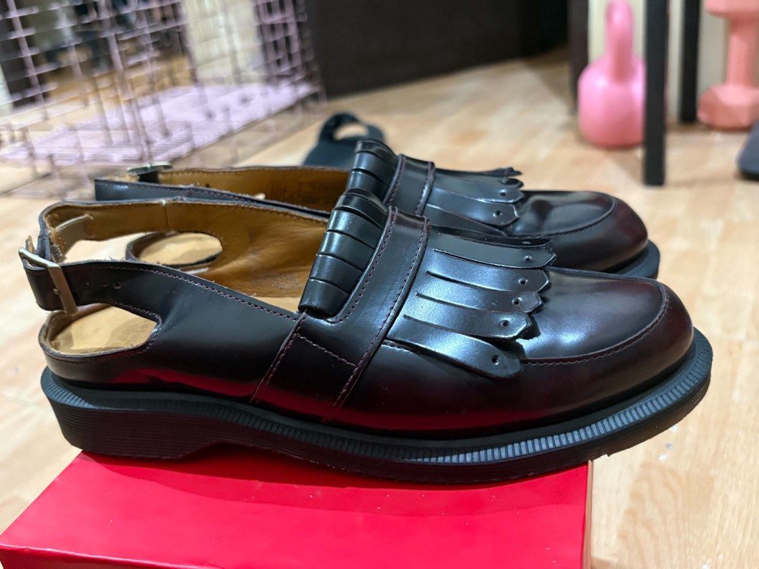 Dr. Martens Cherry Red Valentines (Category: Loafers) located in Aparri. Submitted by lpenny (Listing ID 1462162076, Image 1). Description: - Dr. Martens slingback loafers - Color: Cherry Red - Size: UK 7 - Classic fringe detail on vamp - Adjustable ankle strap - Signature air-cushioned sole - Perfect for adding an edgy touch to your style.