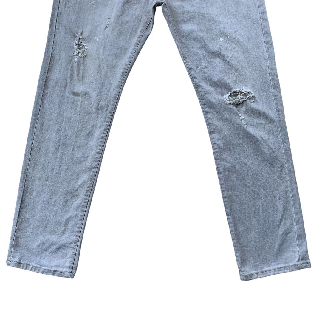 Dsquared2 Grey Distressed Paint Splatter Button Fly Jeans (Category: Jeans) located in Sindangan. Submitted by holy_thrift (Listing ID 1462259914, Image 3). Description: - Dsquared2 Grey Distressed Paint Splatter Button Fly Jeans - waist / 35 - thigh / 12 - length / 40.5 - leg opening / 7 - stretchy Fabrix - issue / no major issue - free shipping.