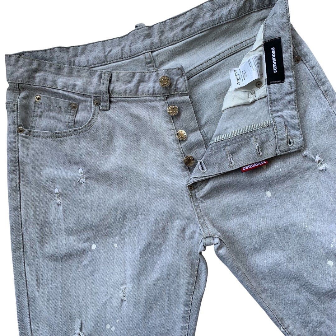 Dsquared2 Grey Distressed Paint Splatter Button Fly Jeans (Category: Jeans) located in Sindangan. Submitted by holy_thrift (Listing ID 1462259914, Image 2). Description: - Dsquared2 Grey Distressed Paint Splatter Button Fly Jeans - waist / 35 - thigh / 12 - length / 40.5 - leg opening / 7 - stretchy Fabrix - issue / no major issue - free shipping.