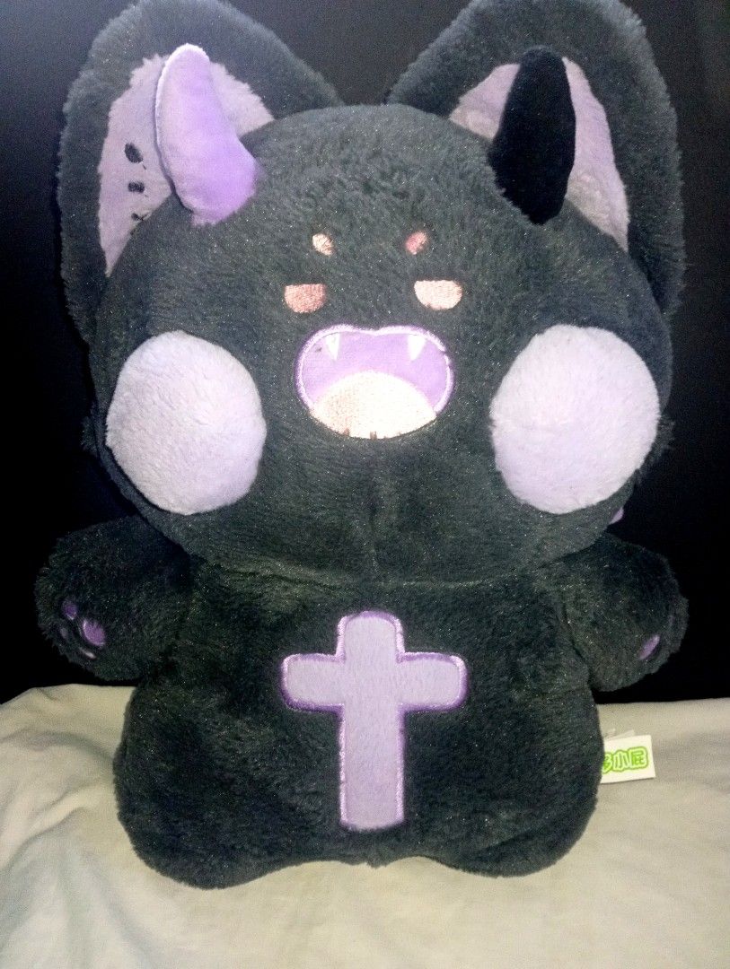 Dudu Cat / Evil Doodle Cat / Demon Meow (Category: Plushies & Soft Toys) located in Tarlac. Submitted by kaizer_rabbit (Listing ID 1462057698, Image 1). Description: Character Name: Dudu Cat (also commonly referred to online as Evil Doodle Cat or Demon Meow) with label/tag. Description: A goth-style goth/devil aesthetic plush doll featuring a fluffy dark grey body. It has large pointy ears, mismatched mismatched horns (one purple and one black), 