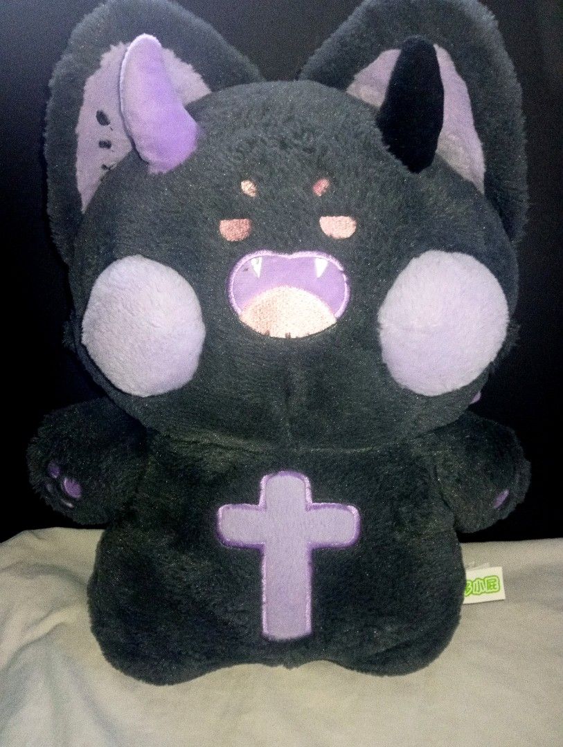 Dudu Cat / Evil Doodle Cat / Demon Meow (Category: Plushies & Soft Toys) located in Tarlac. Submitted by kaizer_rabbit (Listing ID 1462057698, Image 2). Description: Character Name: Dudu Cat (also commonly referred to online as Evil Doodle Cat or Demon Meow) with label/tag. Description: A goth-style goth/devil aesthetic plush doll featuring a fluffy dark grey body. It has large pointy ears, mismatched mismatched horns (one purple and one black), 