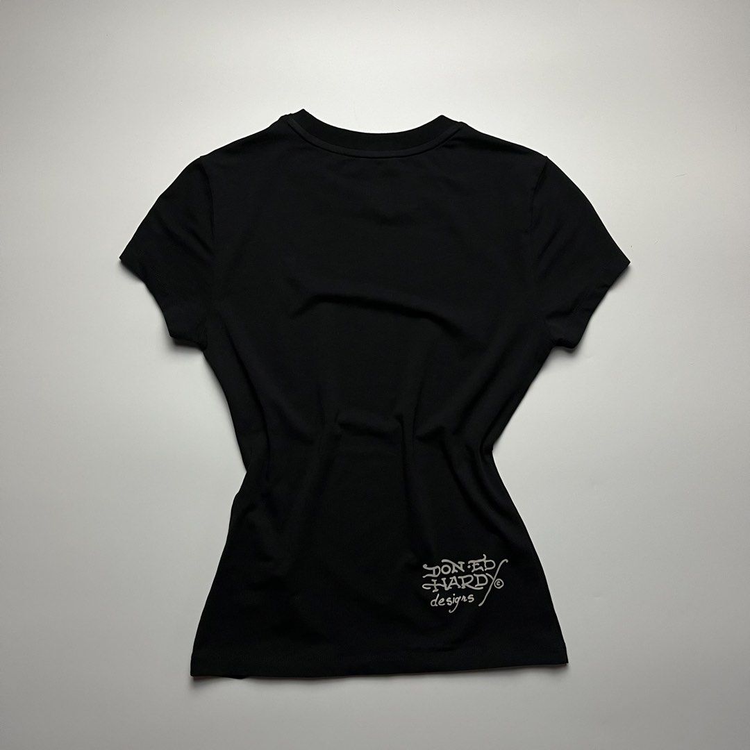 Ed Hardy Rhinestones Tiger Tee (Category: Shirts) located in Manila. Submitted by streetsavvy (Listing ID 1462134934, Image 2). Description: Ed Hardy Rhinestones Tiger Tee Size: Xs Width: 15” Length: 21” Shoulder: 13” Sleeve Length: 5” Hem: 14” Measured in Inches Condition: Excellent condition Made in china.