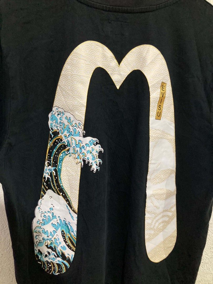 EVISU Kamon and The Great Wave Daicock Tee (Category: Tshirts & Polo Shirts ) located in San Jose del Monte. Submitted by zen31 (Listing ID 1462240737, Image 3). Description: EVISU DAICOCK TEE 22.5X28 DIMENSION EXCELLENT CONDITION 10/10 COLOR RATE NO ISSUE, NEED WASH ONLY.